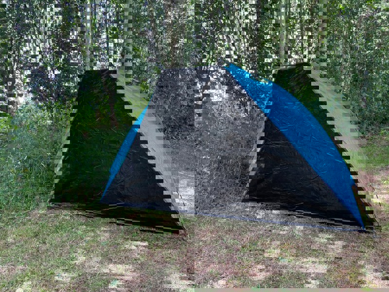 An image of the blue Beach Tent from OLPRO pictured with the groundsheet up/