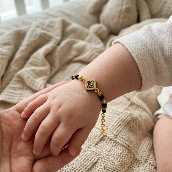 The Colourful Aura Gold Plated Black Bead Om Zircon Centre Charm Kids Nazaria Bracelet