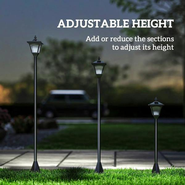 Multiple black outdoor solar lamp posts with lantern heads of different heights
