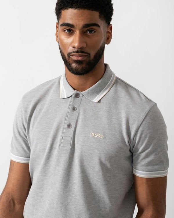Close up shot of a Model wearing a BOSS Green Paddy Mens Cotton-Piqué Polo Shirt with Contrast Logo in Silver