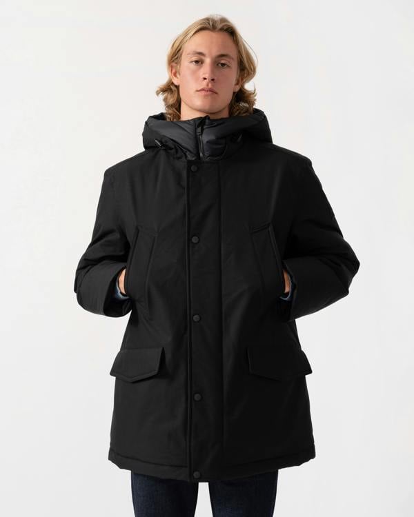 The BOSS Orange Osiass1 Mens Parka - Black 001 zipped zip on a model