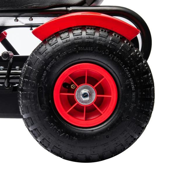 Close-up of front tyre and red wheel rim on a red kids pedal go-kart