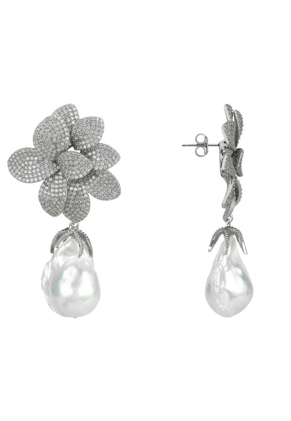 Pair of silver floral earrings with pearl drops on a white background
