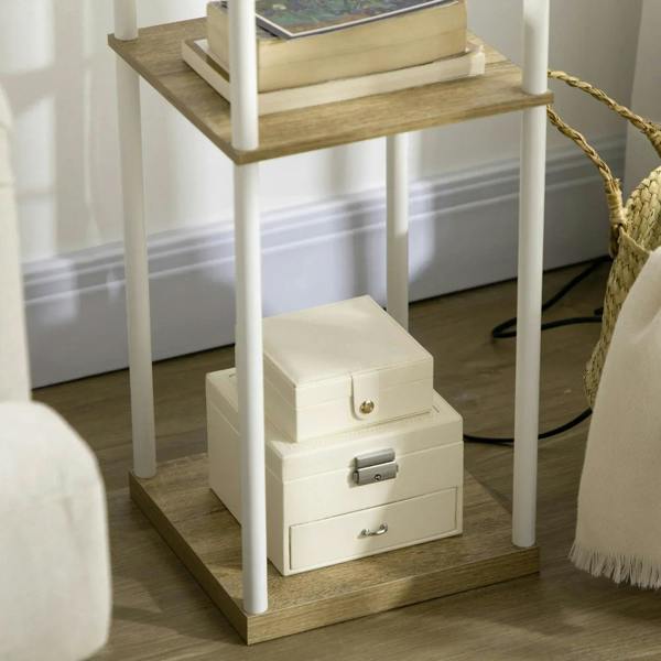 Lower shelf area of white tall floor lamp with wood shelves and two drawer storage