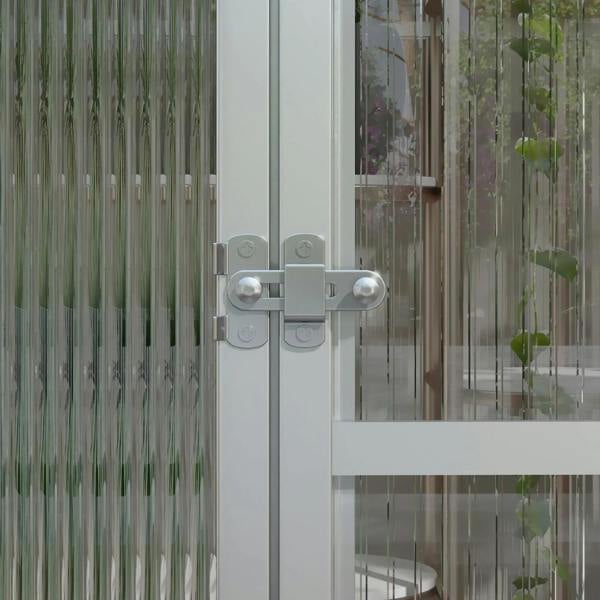 Close-up of greenhouse door latch and hinge on clear polycarbonate aluminium frame.