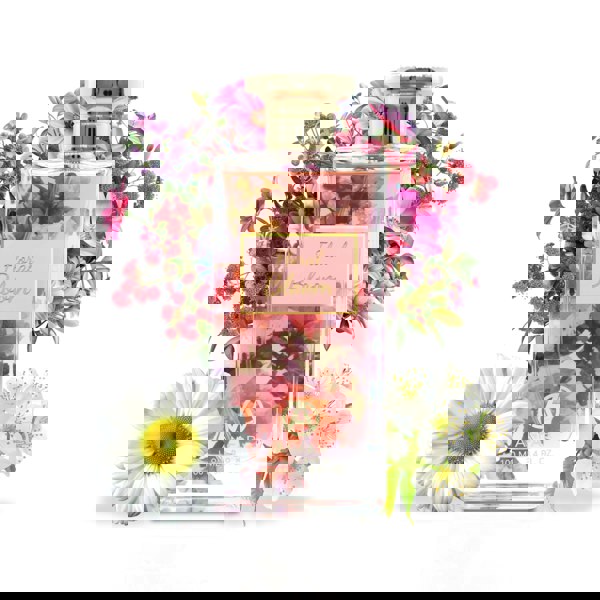 Anfar bottle labelled 'Floral Bloom' surrounded by flowers on a white background