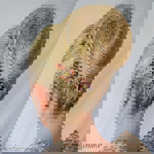 butterfly hair clip brown bun updo