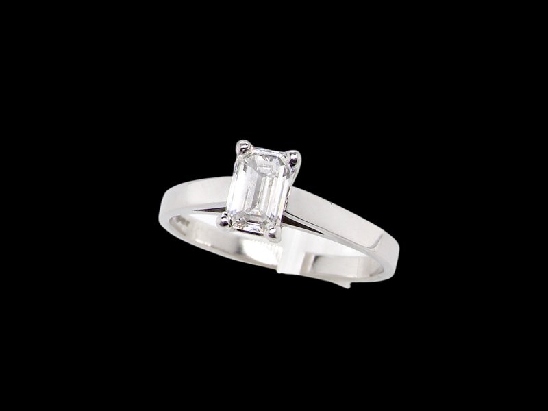 Vintage Tom An emerald cut solitaire diamond ring