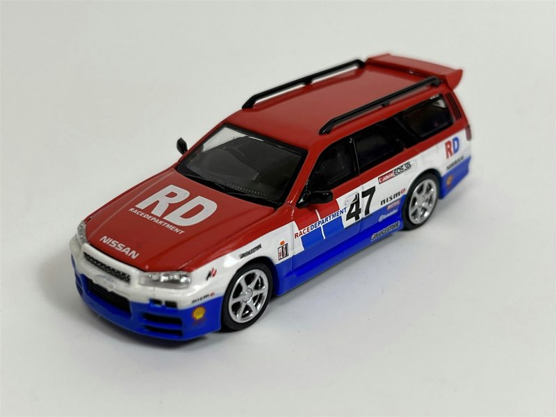 Pop Race Nissan R34 Stegea RB25 Race Department 1:64 Scale PR640001