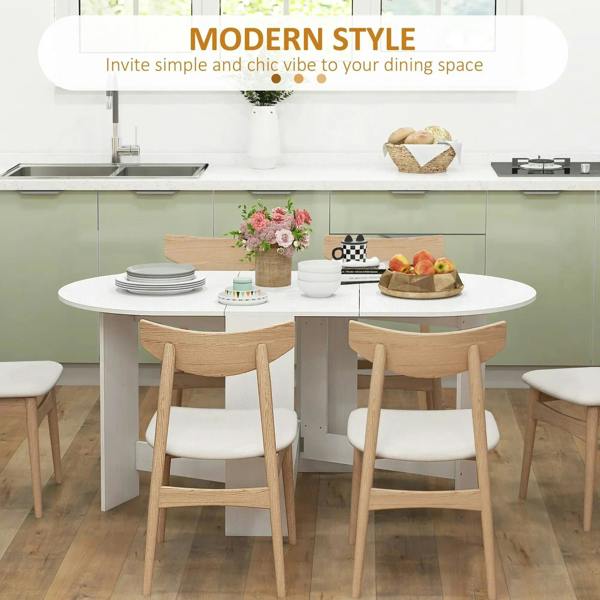 White oval folding dining table with drop-leaf base and open storage panel