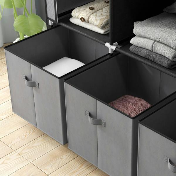 Dark grey fabric wardrobe drawers with open storage bins for linens