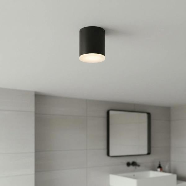 black bathroom ceiling light fixture fitted in a modern bathroom 