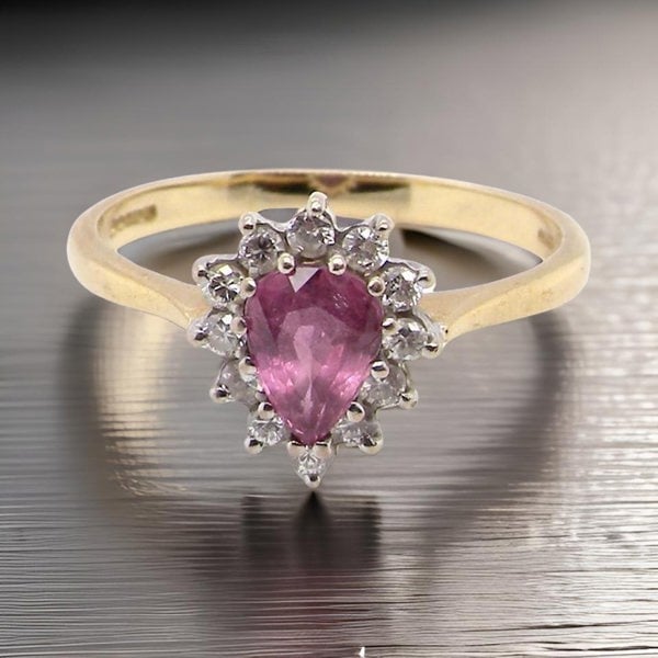 Vintage Tom A pear shaped ruby and diamond cluster ring