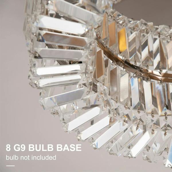 Close-up of crystal ceiling light with clear prisms and shiny metal trim