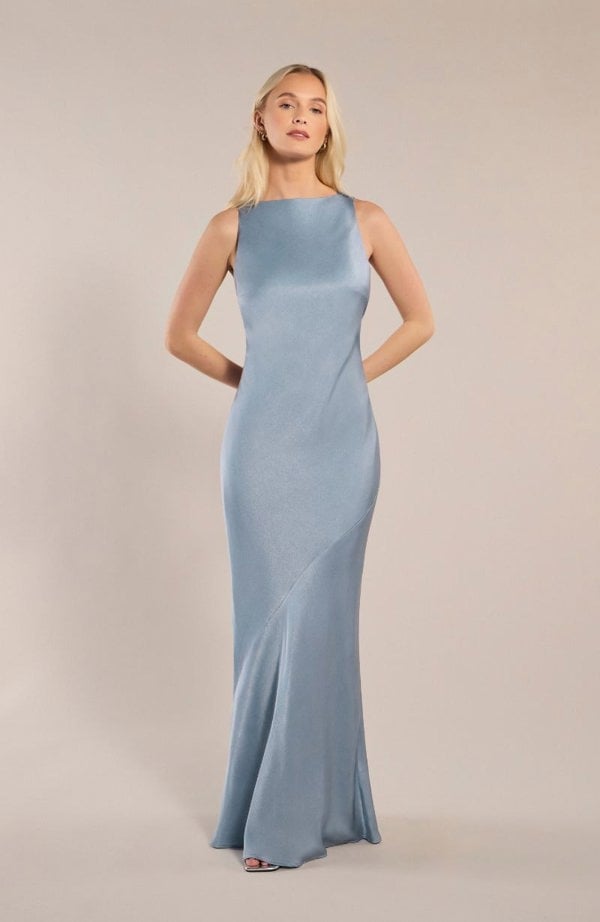 Model wearing blue satin boat neck floor length bridesmaids dress.