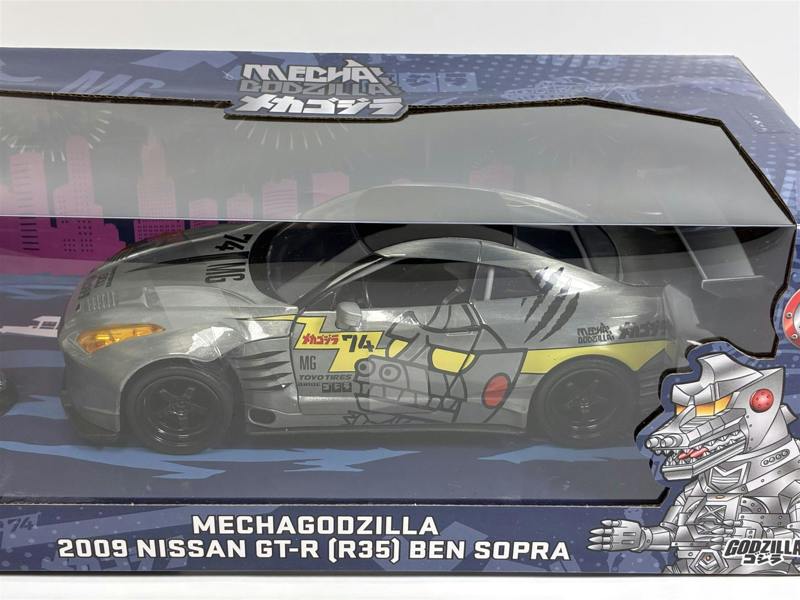 MCSlots Mechagodzilla Figure and 2009 Nissan GT-R R35 Ben Sopra 1:24 Scale Jada 36285