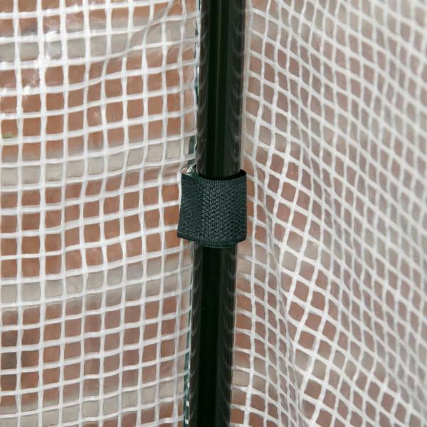 PE cover corner secured to a vertical frame pole with a green fabric strap