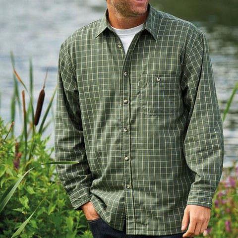 Man outdoors wearing Champion Milton fleece-lined shirt, heavyweight checked layer for farming, walking, or cold weather wear