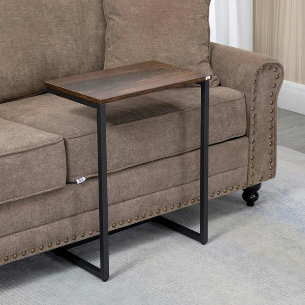Rectangular side table with dark brown top and black steel legs beside sofa