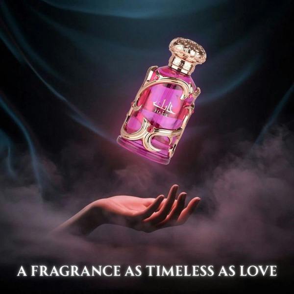 Lattafa Habik for Women Eau de Parfum 100ml bottle above hand with smoke