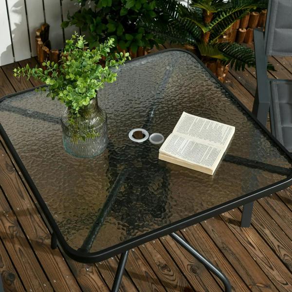 Black square outdoor dining table with tempered glass top and umbrella hole