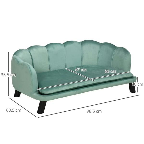 Green dog sofa bed with padded backrest, seat cushion, and four short black legs