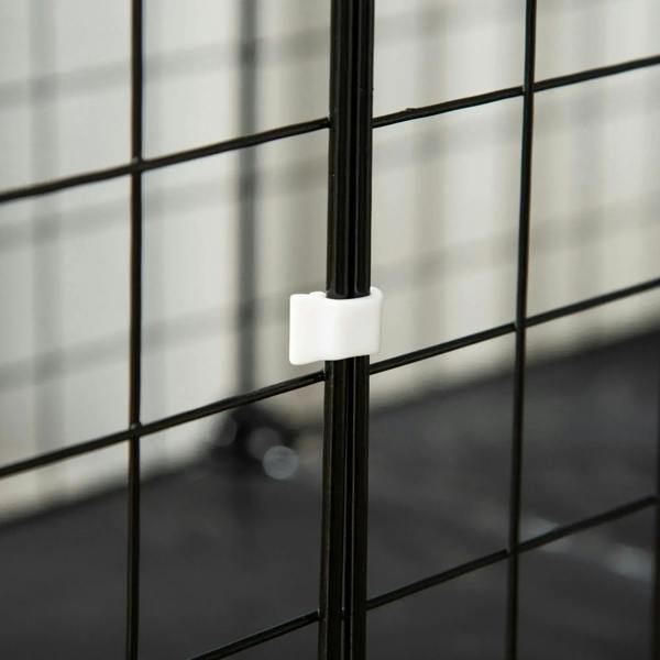 Black wire playpen frame detail showing a plastic door connector and latch