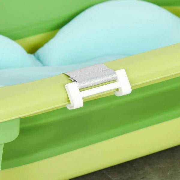 Close-up of adjustable white straps securing a blue cushion inside green tub
