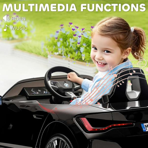 Kids electric ride-on car interior with steering wheel and dashboard controls