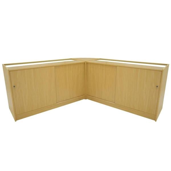 Adonis LED Shop Counter Set in maple finish, featuring a sleek corner design with smooth surfaces and glass display tops