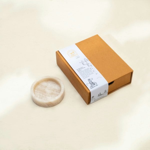Beige marble ring trinket dish close up genuine stone