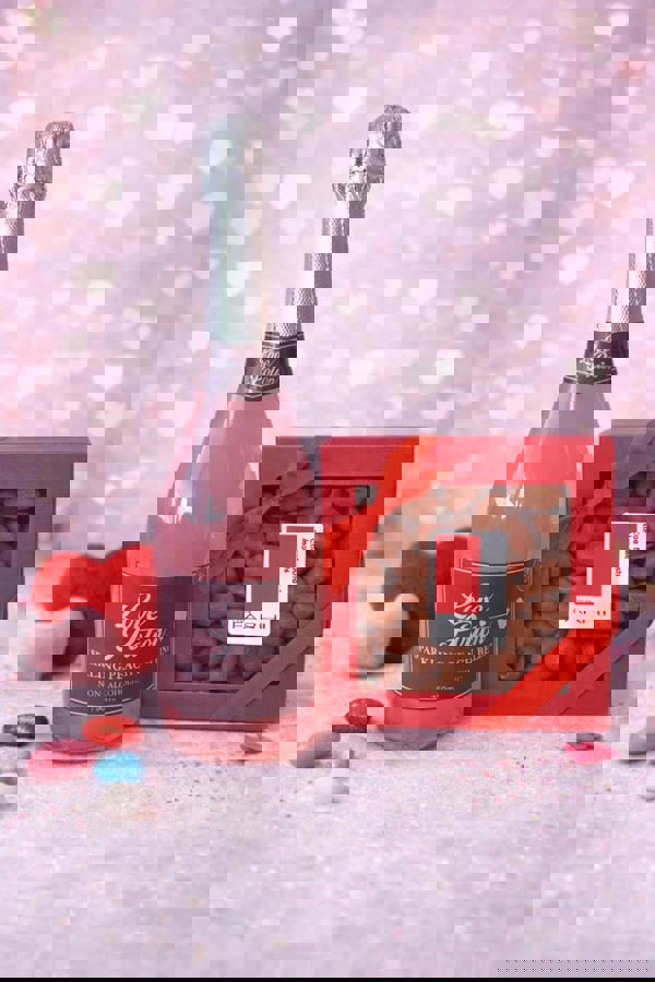 Rita Farhi Non-Alcoholic Love Potion Peach Bellini & Cocoa-Dusted Almonds