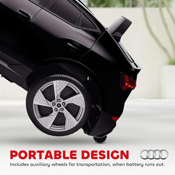 Black ride-on car rear wheel with detailed spokes and auxiliary transport wheels