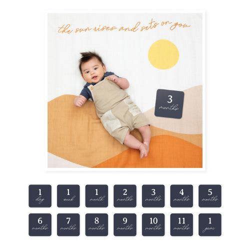 Lulujo - Baby's First Year Gift Set -  Cotton Swaddle & Cards - Sun Rises