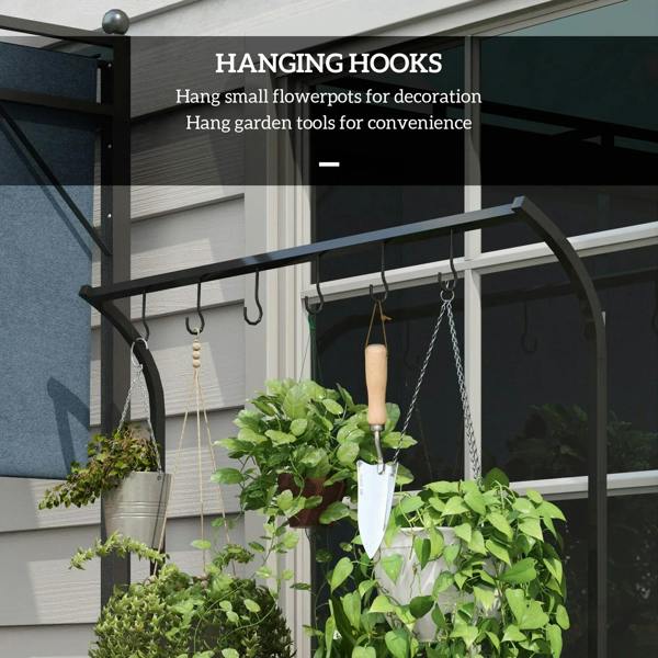 Black plant rack with hanging hooks above potted plants, porch entry view