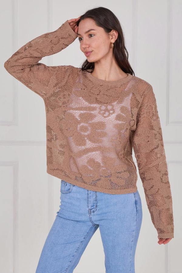 Model wearing a long sleeve crochet top with an open-knit pattern, styled with high-waisted jeans, featuring a relaxed fit and lightweight texture for casual everyday wear.