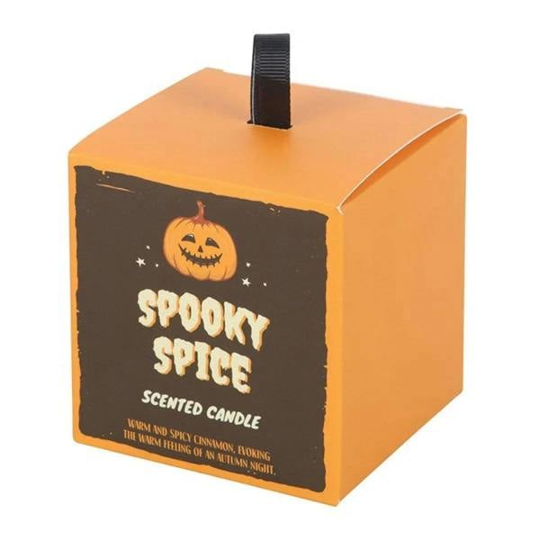 Spice candle gift box with black label and jack-o’-lantern icon, top handle