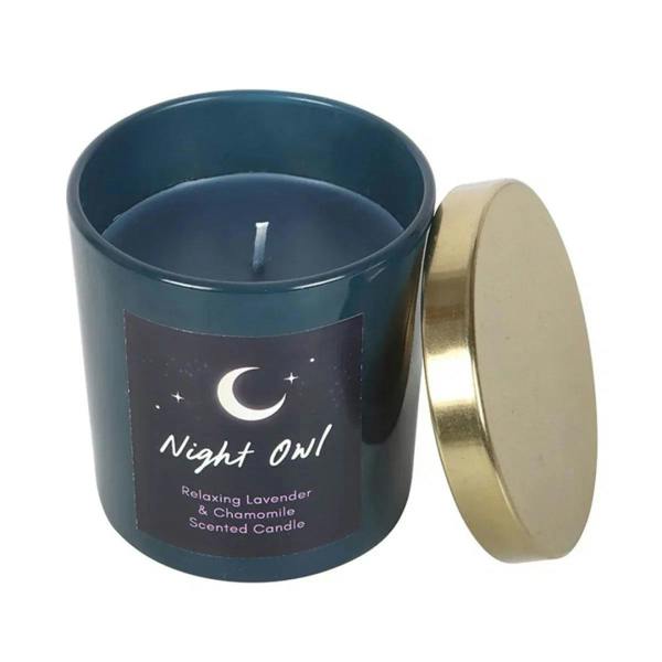 Dark blue candle jar with open gold lid, moon and Night Owl label