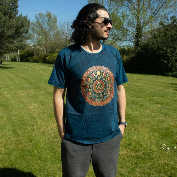 Blue stonewashed cotton T-shirt with circular “Stay Wild Moon Child” front graphic