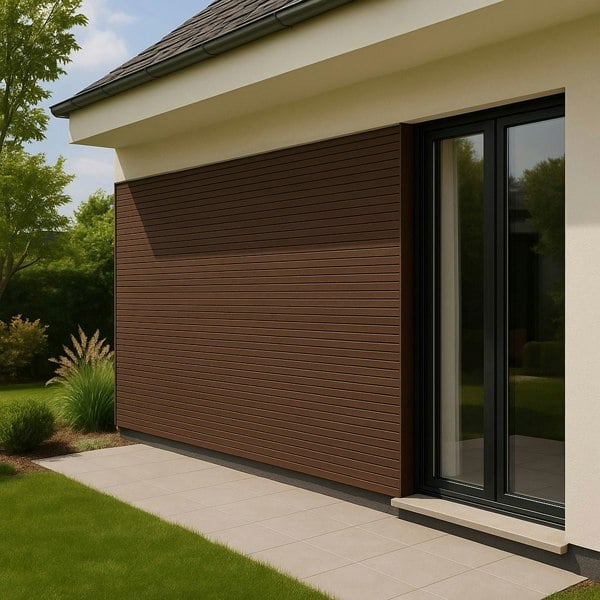 WPC slatted wall cladding panels in rich brown, showcasing a sleek, modern design, installed on a contemporary exterior wall