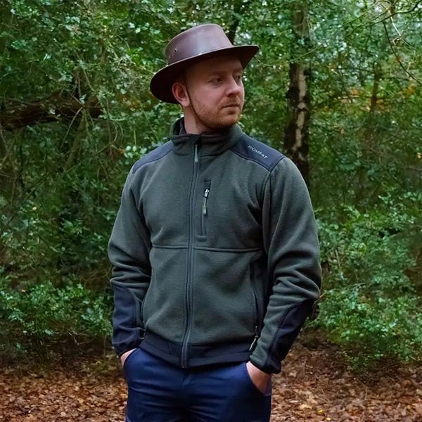 Man wearing a wombat fleece jacket and leather hat