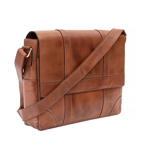 Side profile of Brown  leather messenger bag showing 9cm depth and padded construction