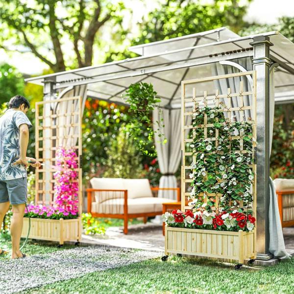 Mobile wooden raised planter with trellis, filled with flowers and vines outdoors.