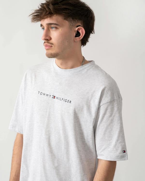 close up shot of a model wearing a Tommy Hilfiger Logo Mens Lounge Tee in Ice Grey Heather