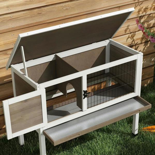 Brown wooden guinea pig hutch with open roof showing wire enclosure and tray