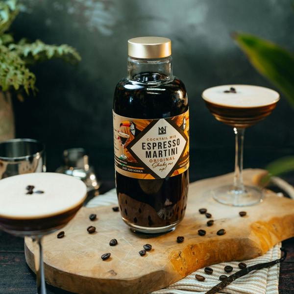 Natural & Noble Espresso Martini Cocktail Kit Filled with Alcohol, Alongside Two Filled Martini Glasses
