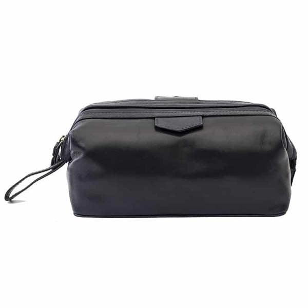 Top view of Black leather washbag on a white background