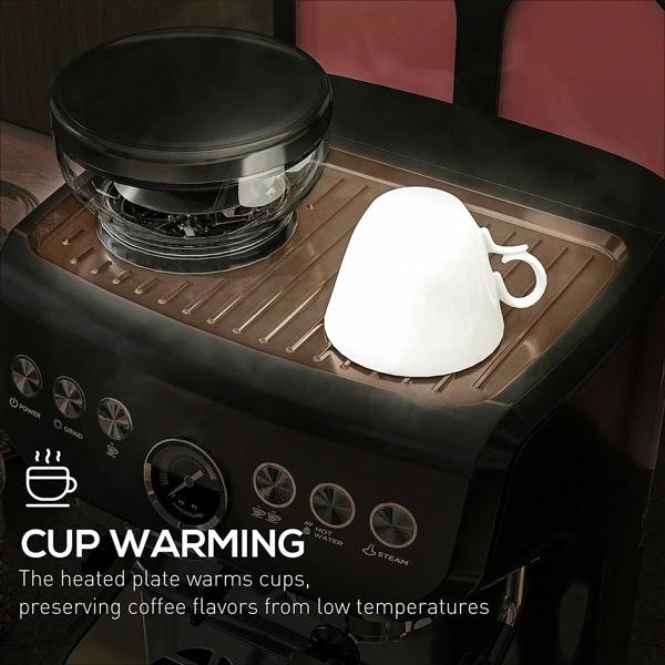 Black espresso machine cup warming plate with an upside-down white cup