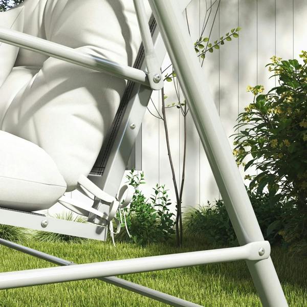 White patio chair cushion set with tie straps at corners on a metal swing frame