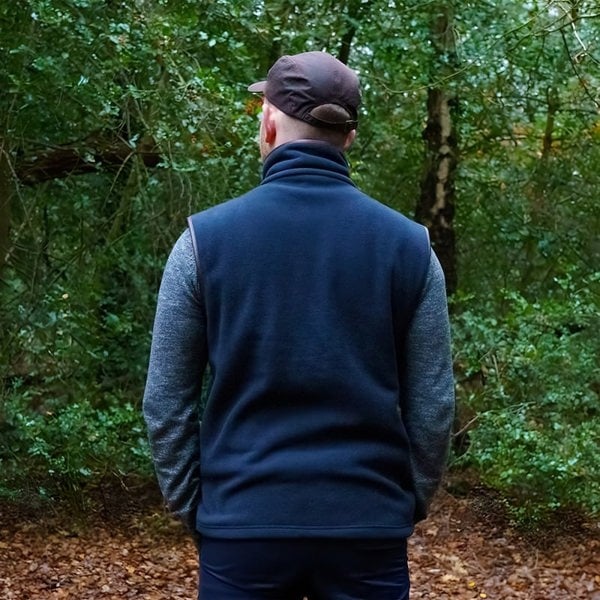 man wearing a wombat navy outdoor gilet